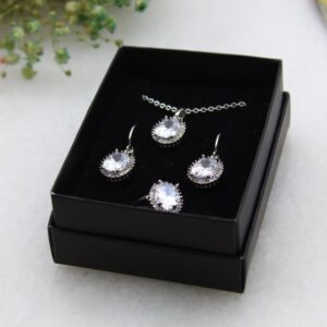 silver set of necklace ring and earrings